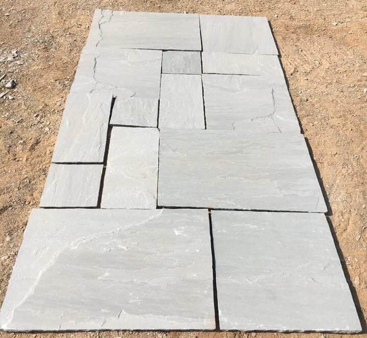 Kandla Grey Sandstone natural split slabs and tiles by Pushpa Stone Impex